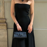 MIRUM bag luxury vegan bags best sustainable handbags savette pochette symmetry pochette savette pochette kelly pochette top handle bag 2025 it bags Stella mccartney ryderbag themoire the moire ethical luxury Spanish handbag brands Spanish bags black mini bag clutch black bag black bags small black bag