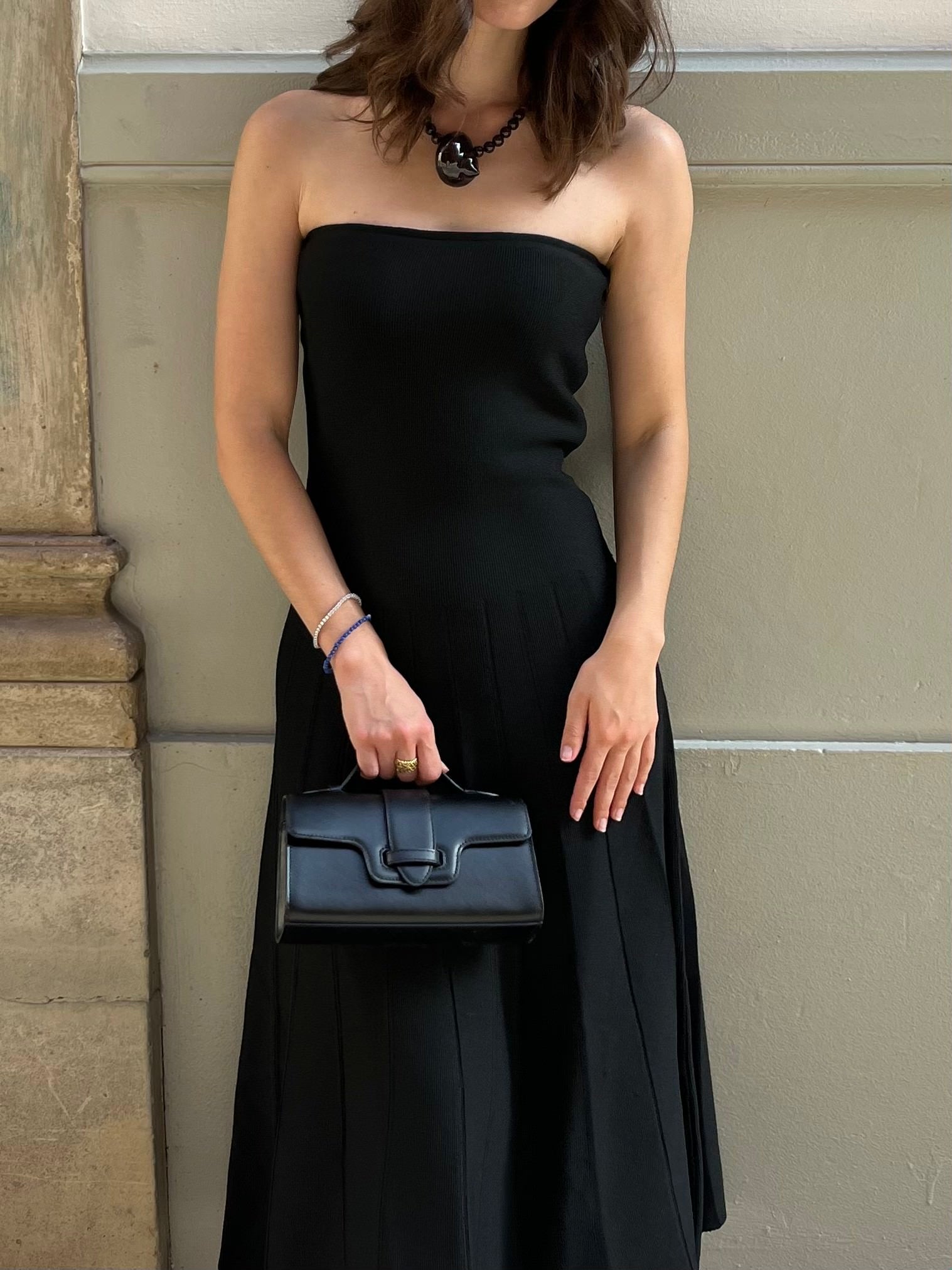 MIRUM bag luxury vegan bags best sustainable handbags savette pochette symmetry pochette savette pochette kelly pochette top handle bag 2025 it bags Stella mccartney ryderbag themoire the moire ethical luxury Spanish handbag brands Spanish bags black mini bag clutch black bag black bags small black bag